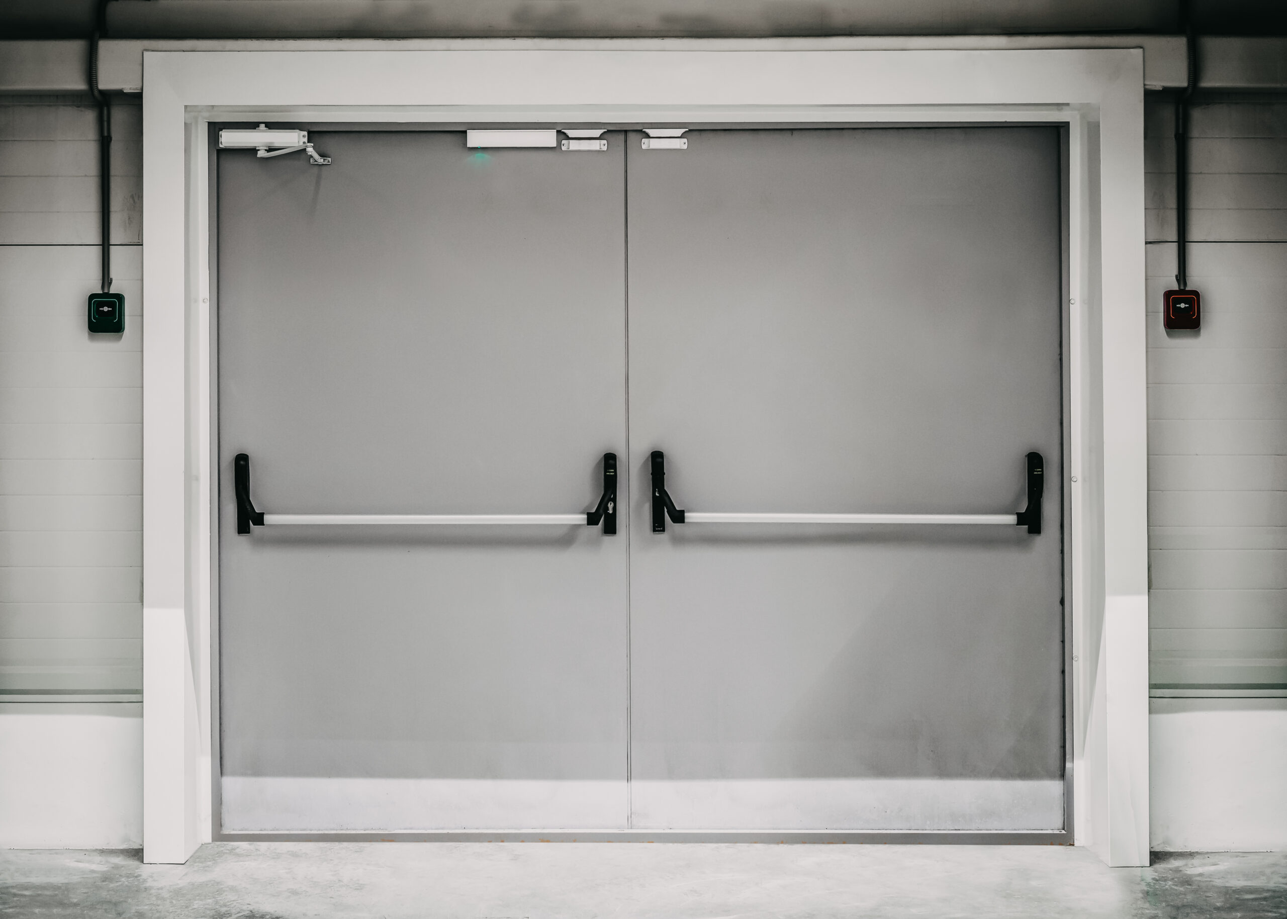 Closed emergency or fire exit door and push to open door for qui